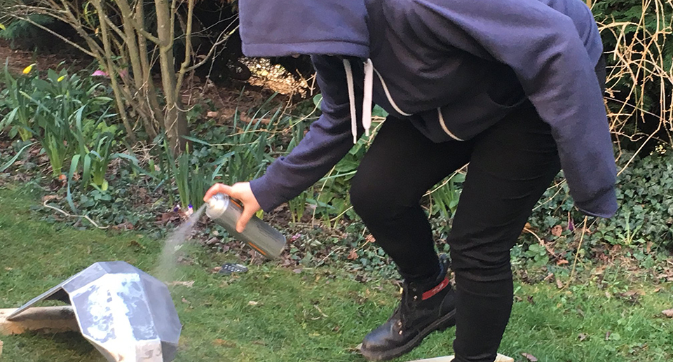 Sarah painting an armour panel