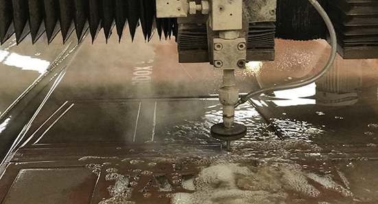 Tauron's Hardox being cut by water jet